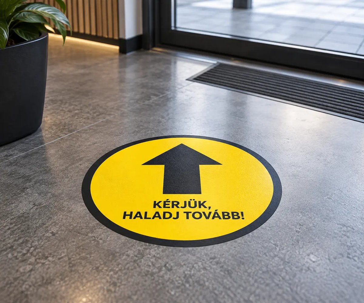 Kör alakú irányító padlómatrica üzlet bejáratánál